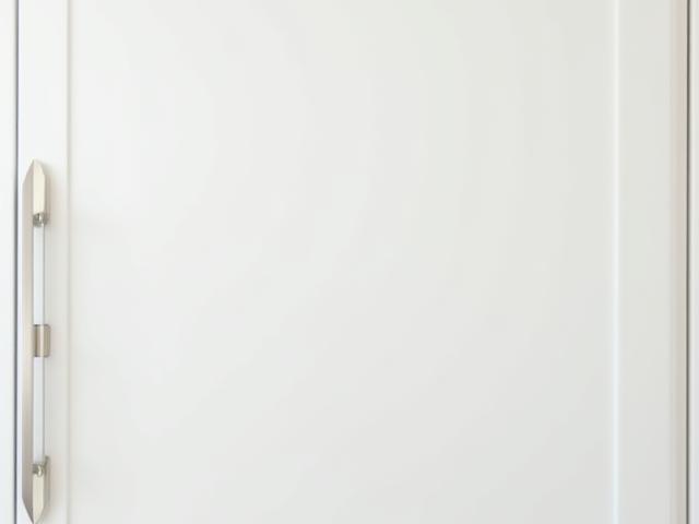 New kitchen cabinet installation, white and modern.